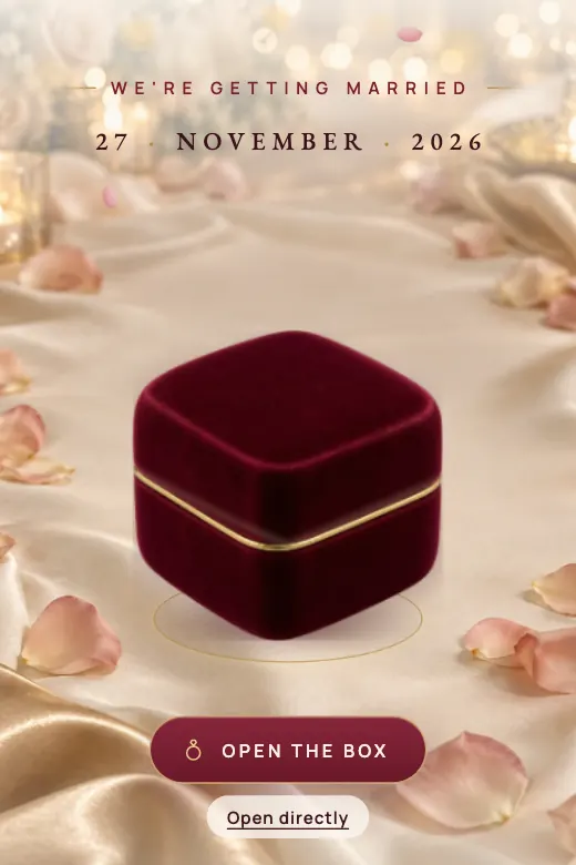 Design Ring Box — A velvet box that opens to reveal the ring with your names · wine, ivory, and gold